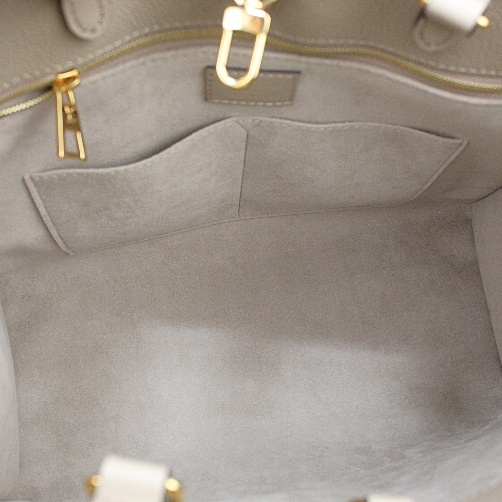 Onthego MM Monogram Empreinte Tourterelle Hand Bag