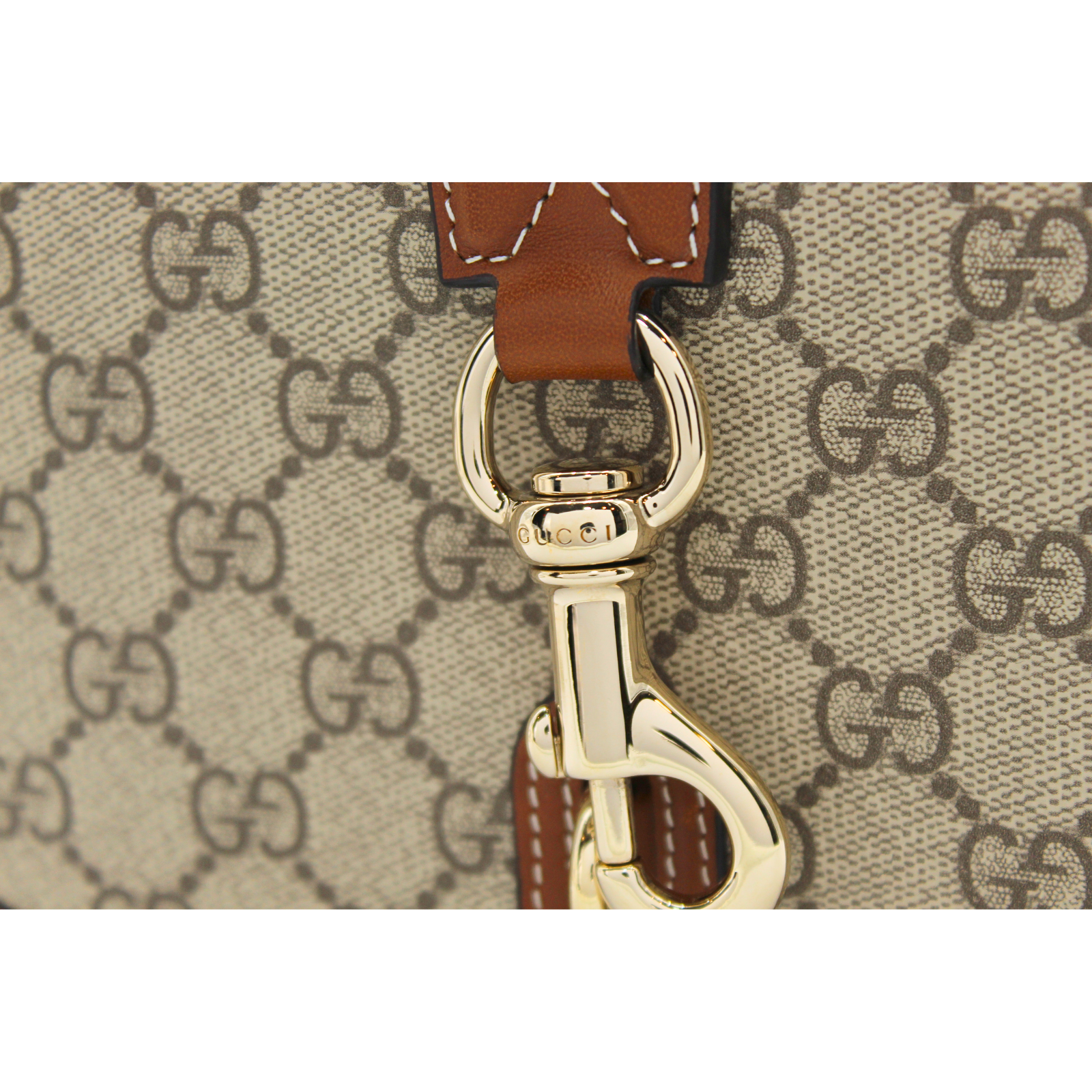 GG Emblem Coated Canvas Handbag