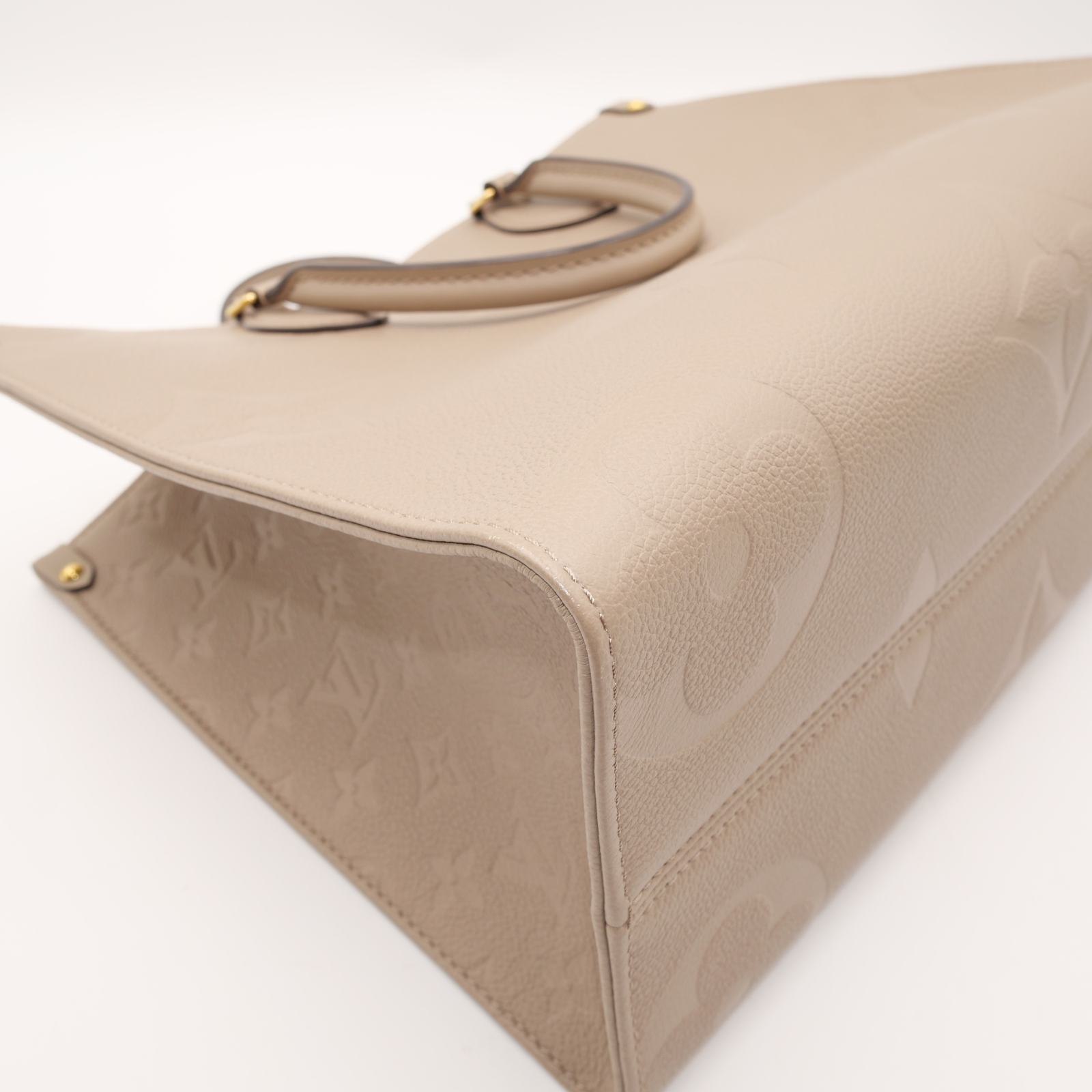 Onthego MM Monogram Empreinte Tourterelle Hand Bag