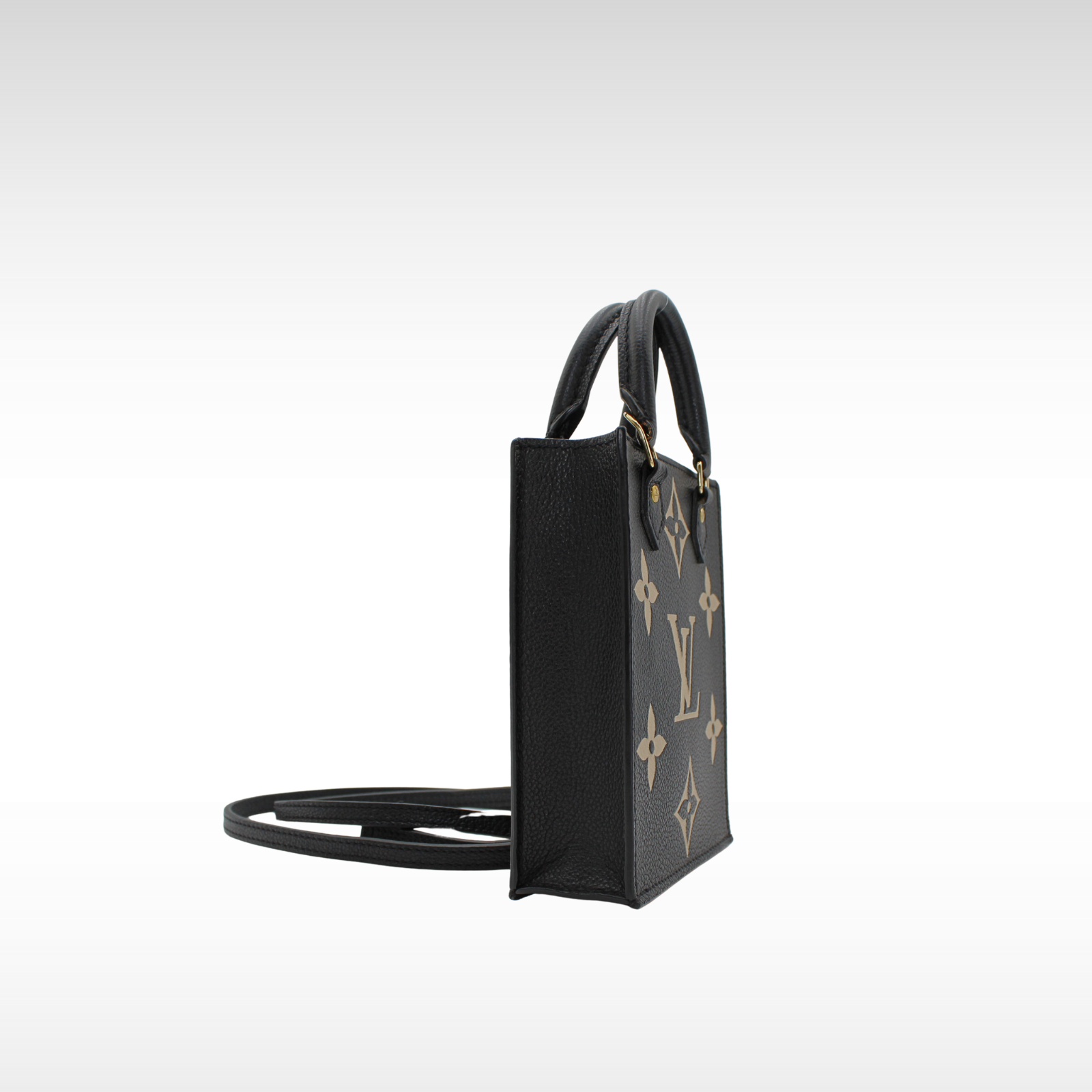Petit Sac Plat Monogram Empreinte Hand bag