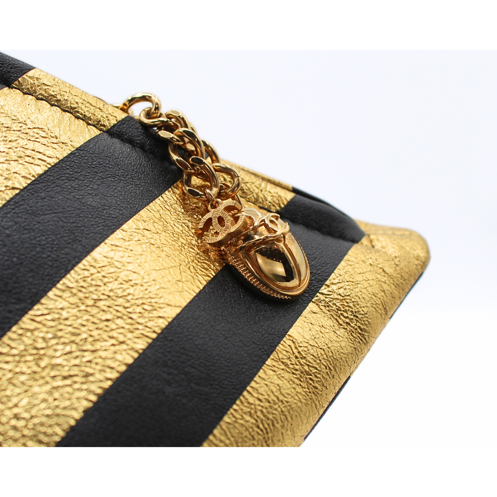 Pyramid Lamb Gold + Black Handbag