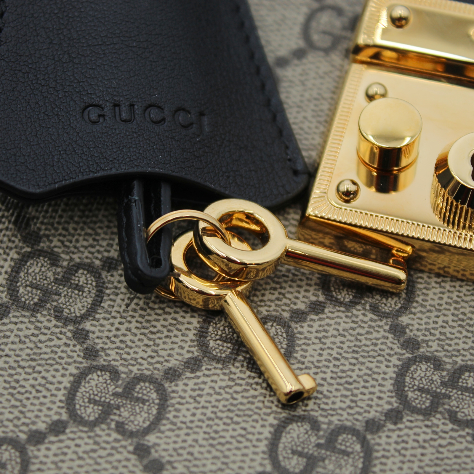 Padlock Coated Canvas Shoulder Bag